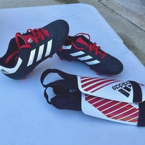 Adidas soccer cleats and shin guards
